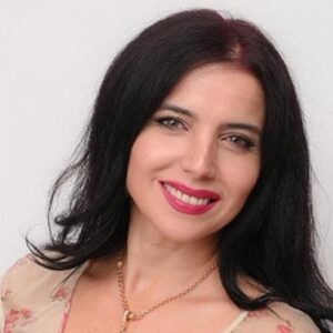 Tamuna Gabilaia (woman with long dark hair and red lipstick)